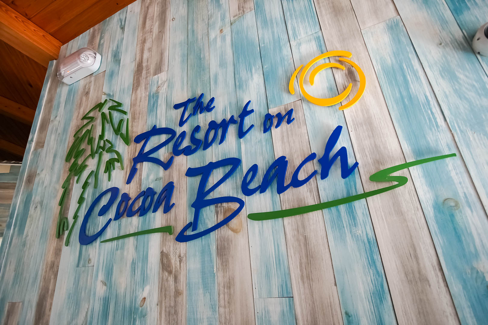 The colorful resort signage at VRI's The Resort on Cocoa Beach in Florida.